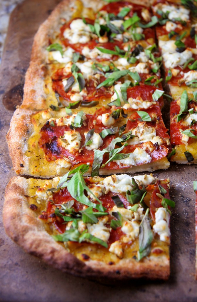 Spicy Salami Pizza with Fennel Seeds, Goat Cheese and Fresh Basil