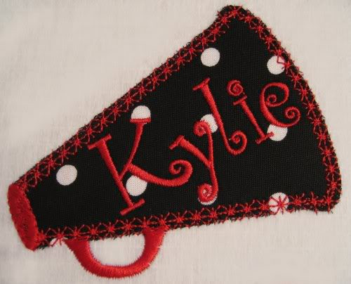 the heirloom stitch megaphone and our #147 CurlyQue 1" Font was used.
