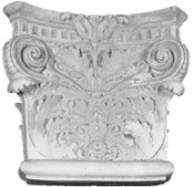 Ornate acanthus leaves and turning top corner volutes are featured on this angular cast gypsum capital.  Roman Corinthian