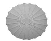 Pointed sunburst patterns, central ring and scalloped outside border