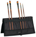 Folding Brush Wallet folds lengthways to protect your brushes in transit, and widthways to serve as an easel while you paint.