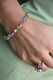 Basic Bracelet shown in 18k Gold Vermeil Pastel. Shown with Cluster Ring in 18K Gold Vermeil Pastel.
