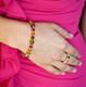 Basic Bracelet shown in 18K Gold Vermeil Cabrina. Shown with our Stretch Ring in 18K Gold Vermeil Cabrina.