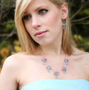 Pastel Polygon Cluster Necklace - Aqua, Rose, Tanzanite, Jonquil, Peridot & Light Amethyst Swarovski crystals with Aqua Swarovski Polygon drops. Shown with Pastel Polygon Cluster Earrings.