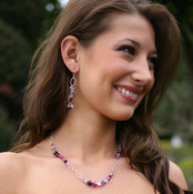 Cupid Necklace in Sterling Silver. Shown with Cupid Cluster Earrings.