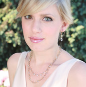 Channel Set Long Necklace (doubled) shown in Gold Crystal (Clear). Shown with the Channel Set Brio Earrings in Gold Crystal (Clear).