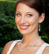 Basic Necklace shown in Sterling Silver Crystal (Clear AB). Shown with Crystal Dangle Earrings in Sterling Silver Crystal (Clear AB).