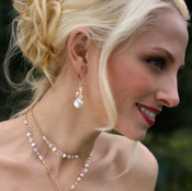 Coin Pearl Cluster Earrings shown in 18K Gold Vermeil. Shown the with Coin Pearl Lariat in 18K Gold Vermeil.