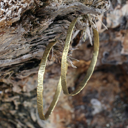 Medium sized brass textured hoop earrings with sterling silver posts Medium sized brass textured hoop earrings with sterling silver posts