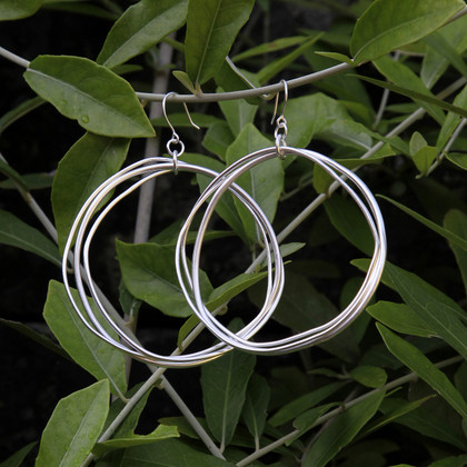 Large multi hoop silver earrings with sterling silver posts Large multi hoop silver earrings with sterling silver posts