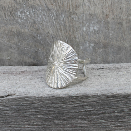 Sterling silver adjustable statement ring with radial texture Sterling silver adjustable statement ring with radial texture