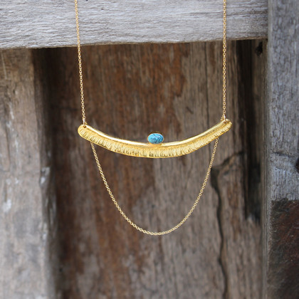Textured bar with turquoise stone detailing and multi-length gold-filled chain Textured bar with turquoise stone detailing and multi-length gold-filled chain