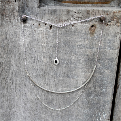 Sterling silver chain with a silver plated bar and black onyx stone detail Sterling silver chain with a silver plated bar and black onyx stone detail
