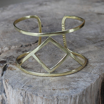 brass statement cuff featuring Transition glyph symbol brass statement cuff featuring Transition glyph symbol