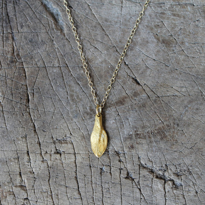 delicate gold necklace with feminine pendant delicate gold necklace with feminine pendant