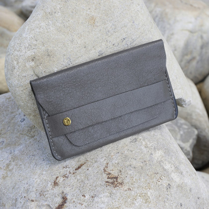 grey leather card case with 'take more detours' brass plate grey leather card case with 'take more detours' brass plate