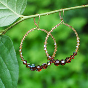 Infinity Earrings shown in 18K Gold Vermeil Browns.