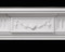 A delicate floral design featured in the center block of The Federal Marble Mantel