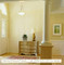 Custom feature wall ties in beautifully to wainscoting in adjoining rooms