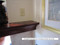We can customize as needed.  Here is an abut end on the mantel shelf.  The shelf abuts directly into the wall