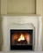 French Modern styling mark this stone fireplace mantel