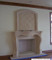 Custom overmantels are available for this stone mantel