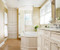 2" beaded birch paneling painted white featured in areas of this en suite bath