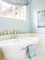 2" beaded birch paneling used as wainscoting below a ledge in a beautiful bathroom