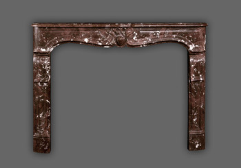 The Savoy reproduction Marble Mantel in Rouge Royal.