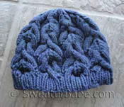 photo of #121 Sumptuously Cabled Hat PDF Knitting Pattern