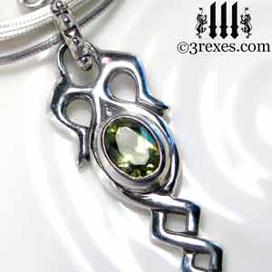 celtic-dripping-silver-necklace-green-peridot-stone-detail-august-birthstone-jewelry celtic-dripping-silver-necklace-green-peridot-stone-detail-august-birthstone-jewelry