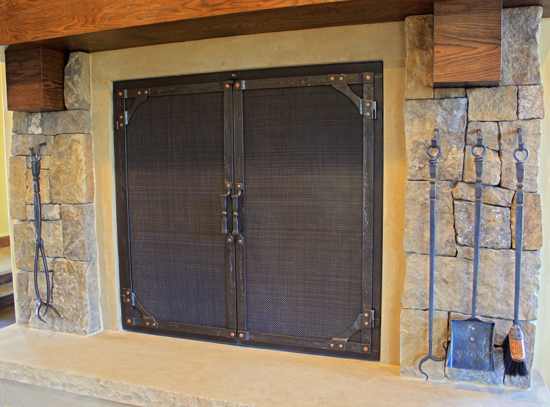 Custom Wrought Iron Fireplace Door Gallery | Ponderosa Forge & Ironworks Visit our Custom Fireplace Door Gallery page. See how custom work from Ponderosa Forge can provide the right accents and fixtures to transform your home. Ask an artist...