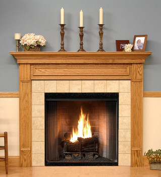 The Forestdale custom fireplace is show in one of the six wood type options available.