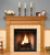 The Forestdale custom fireplace is show in one of the six wood type options available.