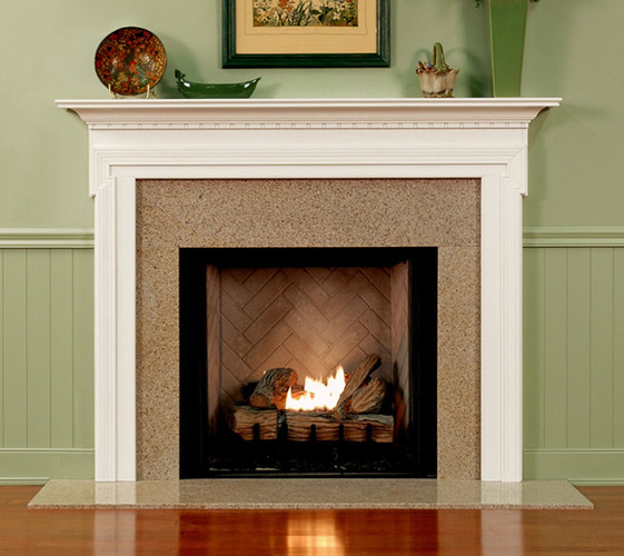 Custom made fireplace mantel with a detailed layered design that will compliment any room