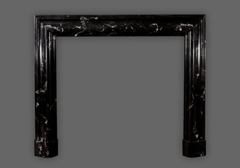 Amazing artwork crafted into the Bolection marble mantel.