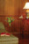 Williamsburg cherry library interior wall paneling used with beadboard below.
