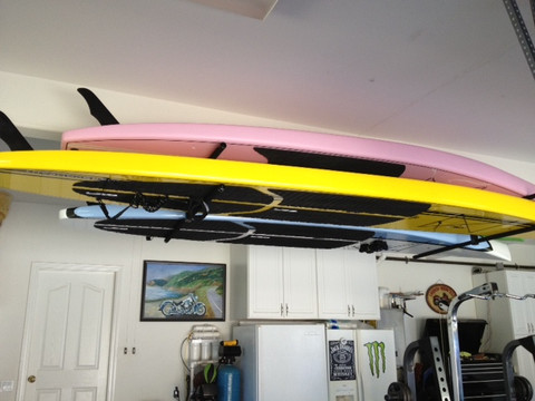Premium Quality Stand up Paddle Board Ceiling Racks. T-Rax Surf Racks are Available with Different Length Support Bars for Longboards and Shortboards.