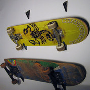 Super Sick Skateboard Wall Hanger. Your Friends Will Wish They Were You When They See Your Boards All T-Raxed Up.