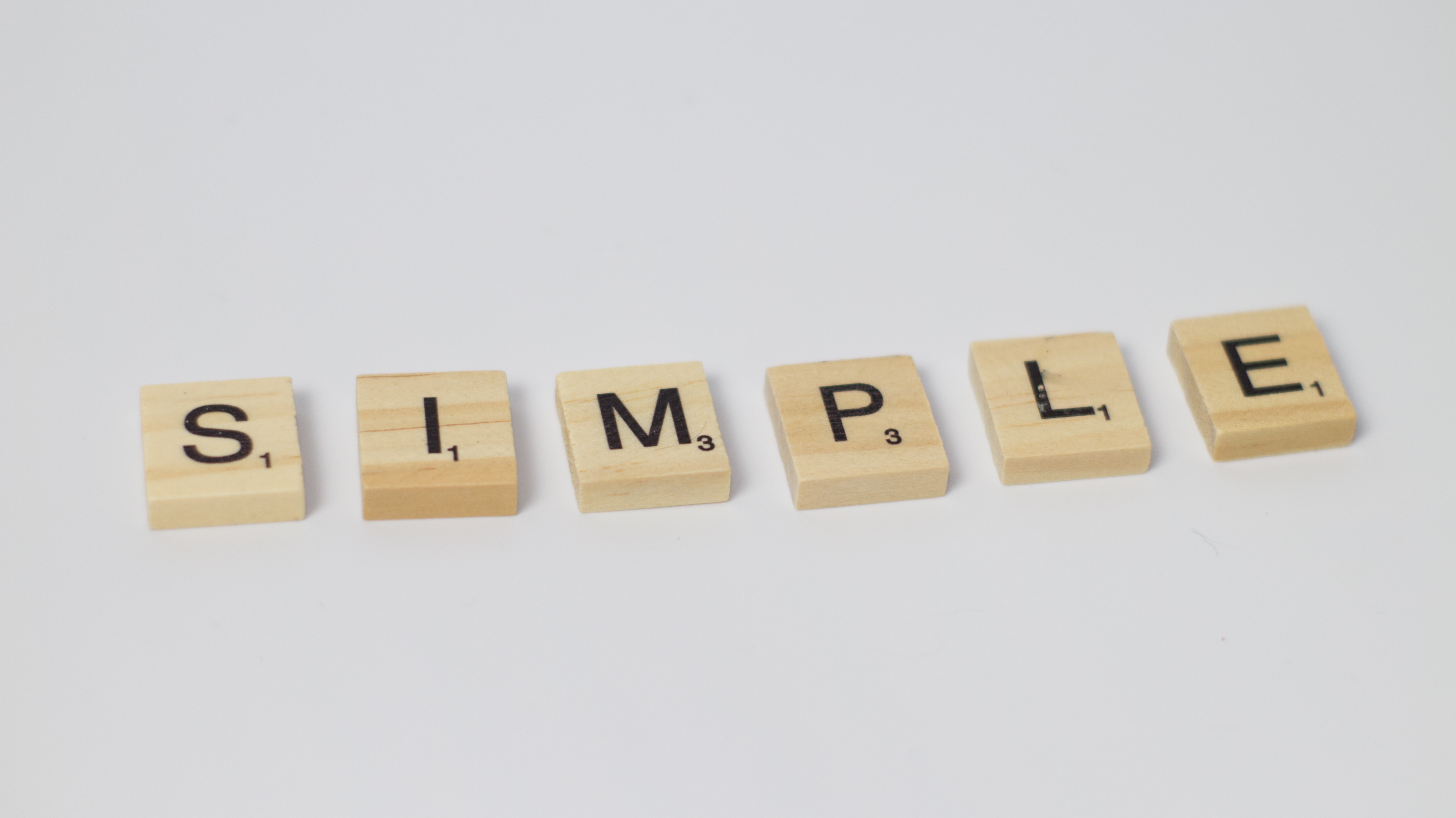 Scrabble letters spell the word simple depicting an easy way to make life changes.