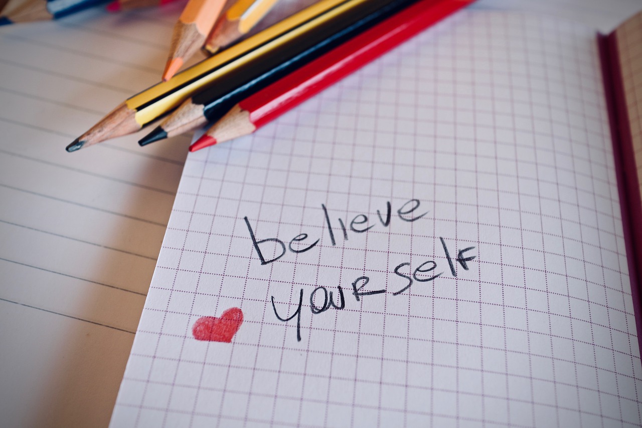 A simple drawing telling people to believe in and love themselves.