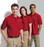 Shown are the Port Authority® polos in men’s and women’s styles (Cool School Studios).