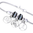 This Triathlon three charm  bracelet features our Milestones swimmer, biker and runner girls in a circle dangle bead. We the dangles with our stunningly brilliant Black and Clear Swarovski crystal beads and finished white off with two sterling silver stopper beads to hold this awesome design in place.