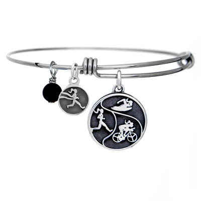 Adjustable Bangle bracelet featuring a Round Tri Girls pendant, runner girl charm and gemstone.