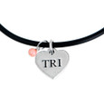 Cute TRI heart necklace on a black rubber code an a cute coral gem stone drop.
