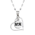 Sterling silver heart pendant with 10K round charm in the center.