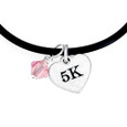 Rubber cord necklace with 5K Heart mini charm and pink Swarovski crystal drop.