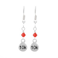 sterling silver 10K dangle earrings with a red crystal.
