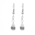 13.1 round sterling silver dangle earrings with a clear crystal on french ear hooks.