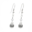 side view of 13.1 round sterling silver dangle earrings with a clear crystal on french ear hooks.